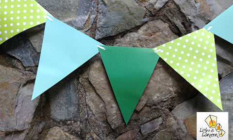 green paper bunting with polka dots