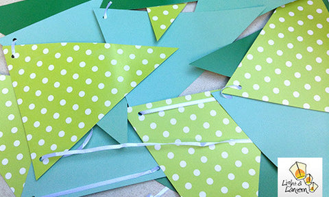 green paper bunting with polka dots
