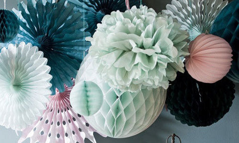 Paper honeycomb balls mixed with pinwheels